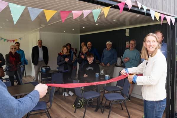 Lady Philippa Walker-Okeover cuts the riddon to formally open the clubhouse. Picture: Three Six Seven Nine Photography