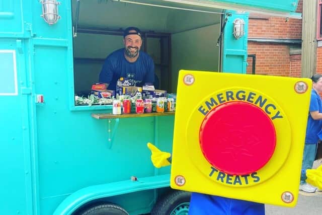 Colleague Box co-founder Adam Bamford in Tilly the Trailer delivering Emergency Treats.