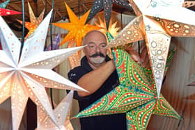 Thirty years later, every Paper Starlight is still screen-printed and punched by hand using traditional techniques. Colours are layered by eye, tissue inserts create the distinctive stained-glass glow, and some designs feature more than 1,000 individually punched pinholes. Pictured is Andy Jupp.