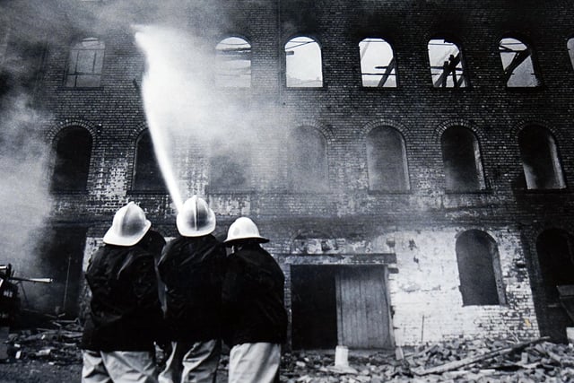Firefighters tackle a blaze  at Robinsons on Chester Street in 1986