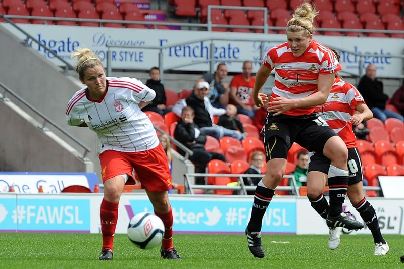 Millie Bright has a shot on goal against Liverpool whilst playing for Doncaster Belles.