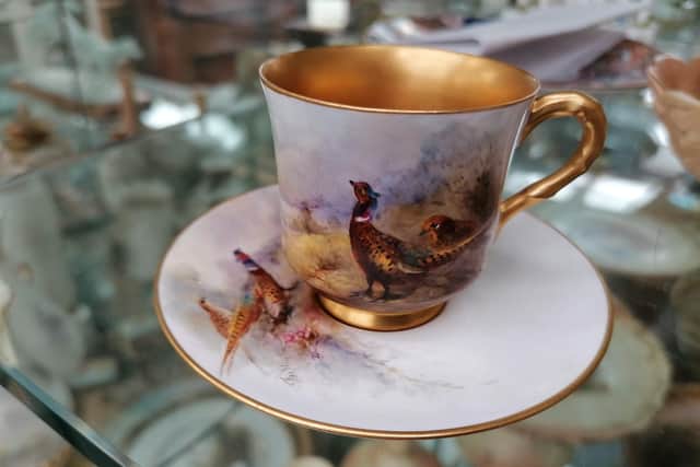 This beautiful cup and saucer is among the items that are coming up for auction.