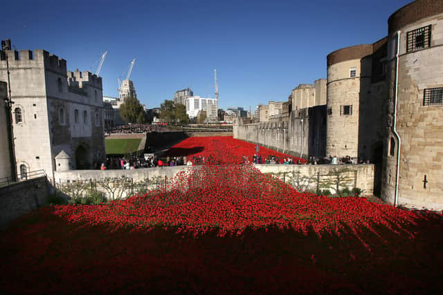 The 'Blood Swept Lands and Seas of Red' installation in the moat of the Tower of London. (Photo by Peter Macdiarmid/Getty Images)