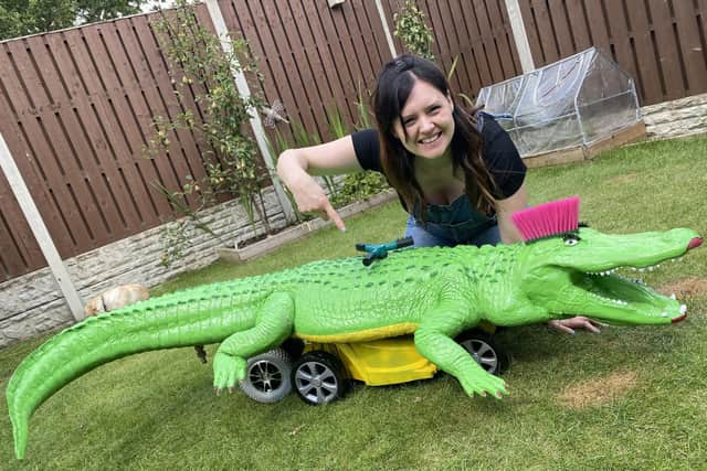 Ruth with the crocodile lawnmower made for the Kids Invent Stuff channel
