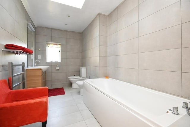 The main bathroom has a modern white four piece suite that comprises bath with shower attachment, wc, bidet, wash basin in a vanity unit with storage below.
