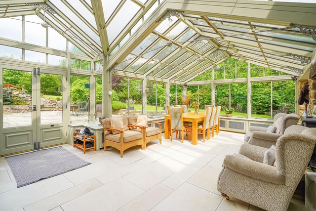 The conservatory is described as fabulous and doubles as a dining space.