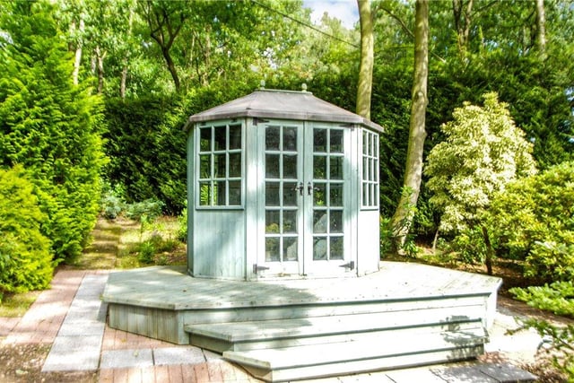Enjoy the tranquility of the garden in this lovely summer house
