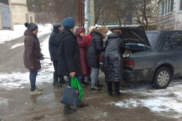 Ukrainian families waiting to receive much needed help.