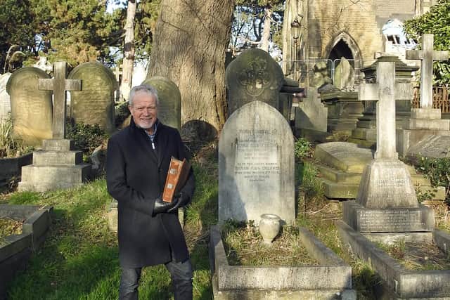 The new chair of the Friends of Spital Cemetery, Alderman Steve Brunt, with a family Bible which will be reunited with the Rathbone family of Warwickshire.