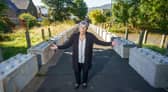 Helene Ball with the concrete blocks placed outside the property blocking vehicle access