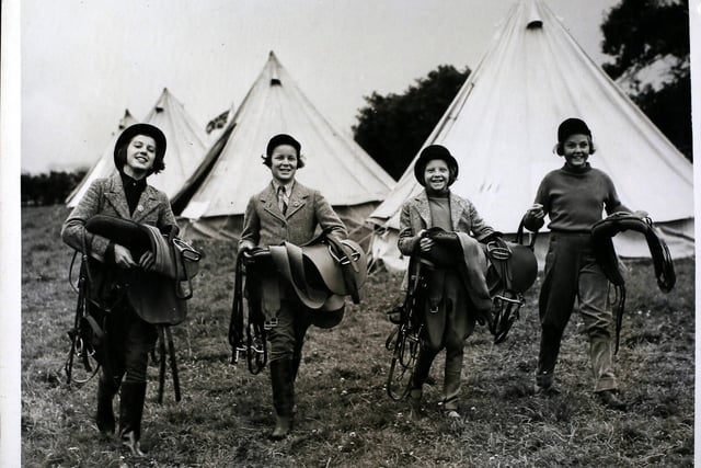 Young Riders Under Canvas, The Barlow pony Club which had 120 members who frequently gave riding displays at local shows and gymkhanas, pictured taking part in their first summer camp under canvas at Offley Place, Old Brampton, Chesterfield. (Photo by Hulton Archive/Getty Images)