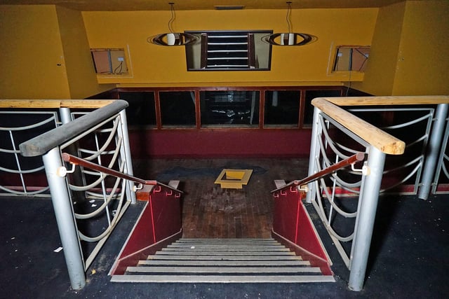 There are numerous flights of stairs within the former nightclub.