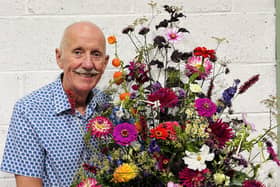 Local florist Robert Young will give a floral demonstration using fresh flowers arranged in antique containers