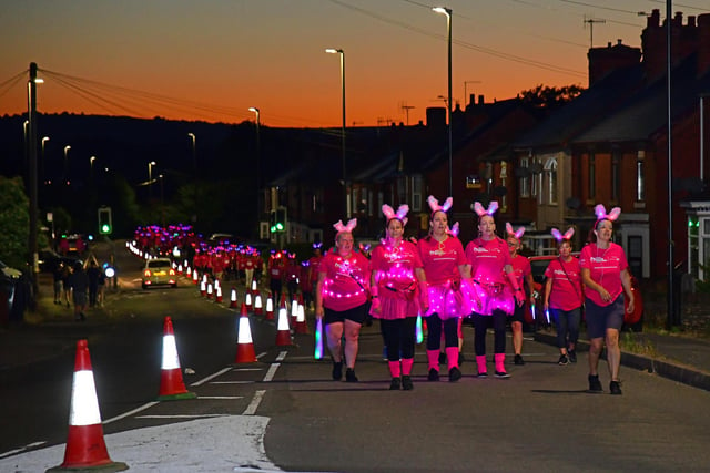 Thousands of walkers dressed in pink T-shirts and flashing bunny ears made a spectacular sight.