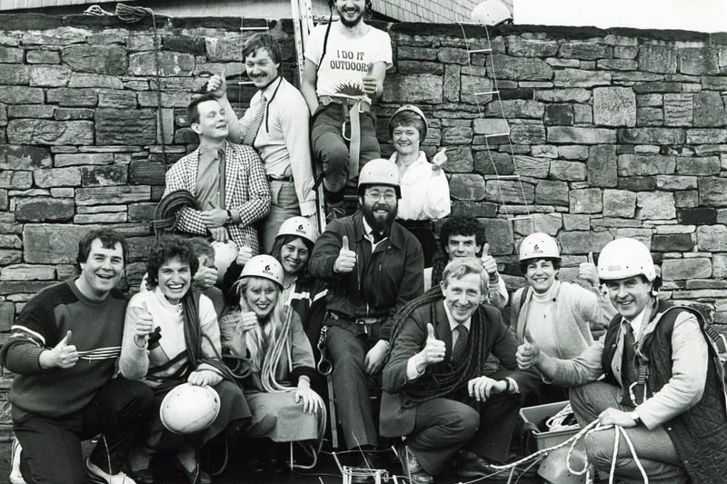 Staff of the Henry Fanshaw School, Dronfield, take part in a climb in aid of the blind in 1986.