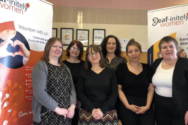 Members of the Deaf-initely Women committee including Office Manager Rachel Shaw (front left) and Managing Director Teresa Waldron (front, second from left)