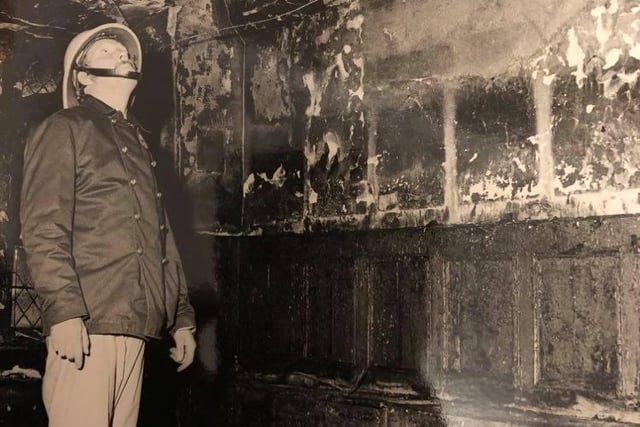 A firefighter surveyed the damage to the tower of Sheffield Cathedral after a fire broke out in July 1979