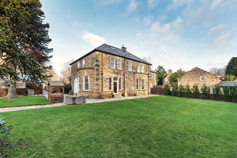The imposing stone built four-bedroom detached house.