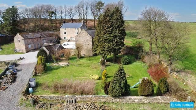 The farmhouse, outbuildings and 15 acres of land at Alice Head Road, Ashover, are on sale for £1.45million.