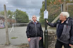 Concerned Chesterfield Borough Council Lib Dem Cllrs Barry Bingham, Left, And Paul Holmes, Right, At A Former Play Area In New Whittington Which Has Been Earmarked By The Labour Led Council For Sale.