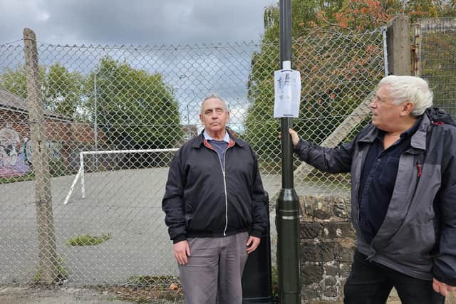Concerned Chesterfield Borough Council Lib Dem Cllrs Barry Bingham, Left, And Paul Holmes, Right, At A Former Play Area In New Whittington Which Has Been Earmarked By The Labour Led Council For Sale.