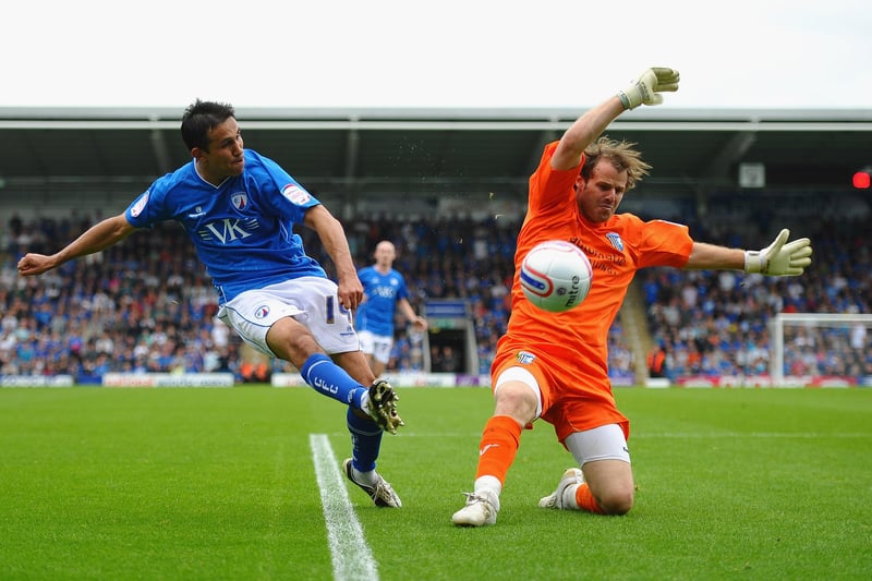 Jack Lester is denied by Alan Julian of Gillingham during the npower League Two match between Chesterfield and Gillingham at the B2Net Stadium on May 7, 2011.