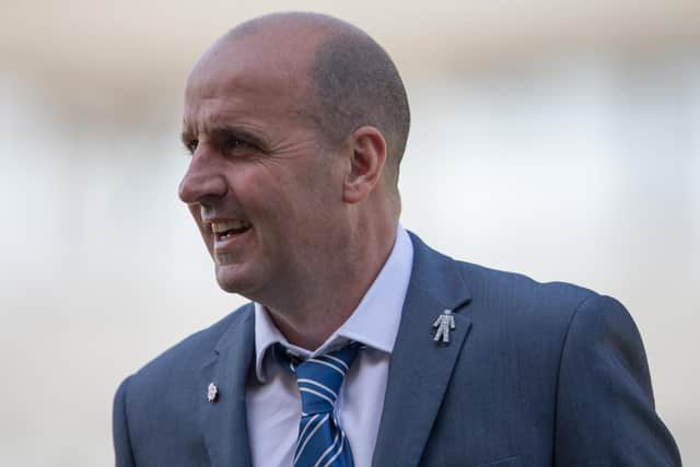 Paul Cook is back at the Spireites.