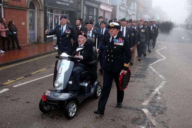 Ex servicemen parade to the church.