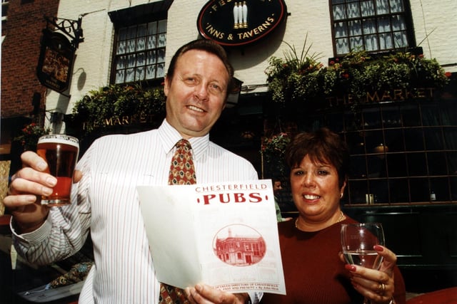 Keith Toone and Jan Travis raise a glass to celebrate the reopening of the Market pub in Chesterfield in 1999.