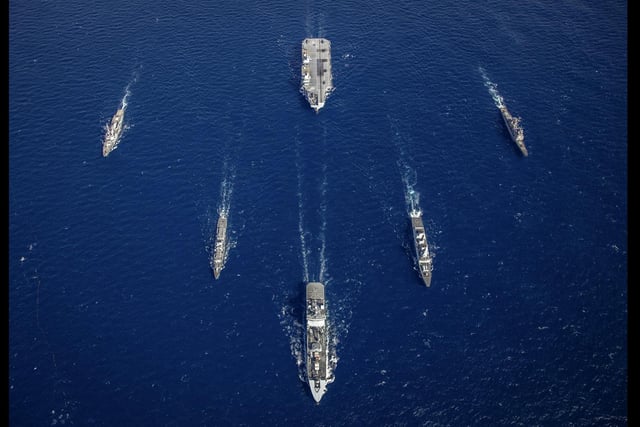 Aircraft carrier HMS Queen Elizabeth, Type 45 destroyer HMS Dragon, Type 23 frigate HMS Northumberland and tanker RFA Tideforce in company with USS Truxton and USS Philippine Sea during exercises off the east coast of the USA. This image was part of the Peregrine Trophy winning selection from HMS Queen Elizabeth. Picture by Leading Photographer Kyle Heller