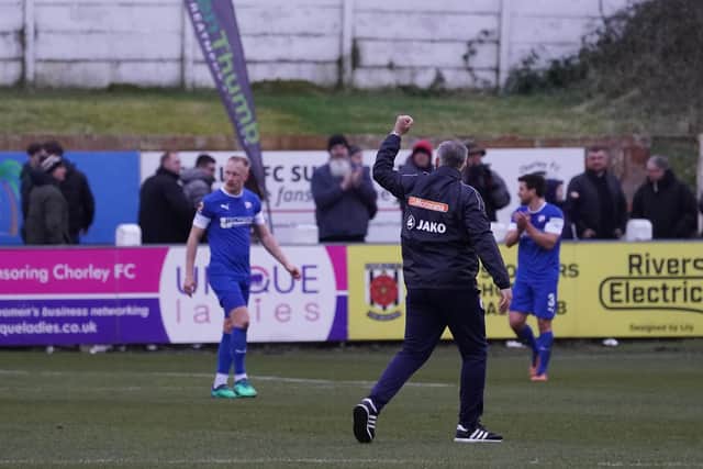 Chesterfield manager John Pemberton salutes the travelling Spireites fans after their victory: