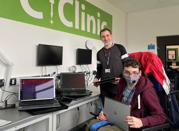 Digital Technologies students Michal Brogowski and Marcus Roe with laptops they are refurbishing