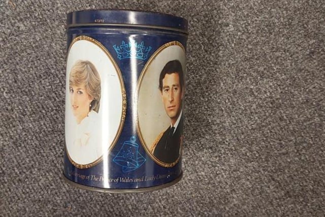 A can with images of Princess Diana and Prince Charles has also been found.