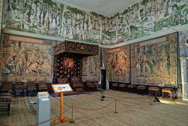 One of the beautiful rooms adorned with tapestries at Hardwick Hall.
