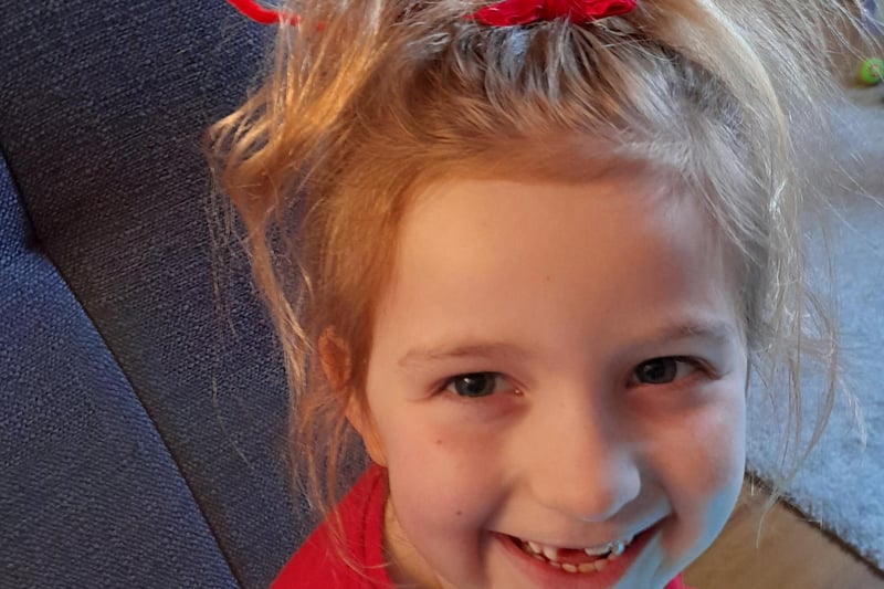 Gateford Park pupil Faith Bailey, age six, looks smashing in her Comic Relief top and hair accessory.