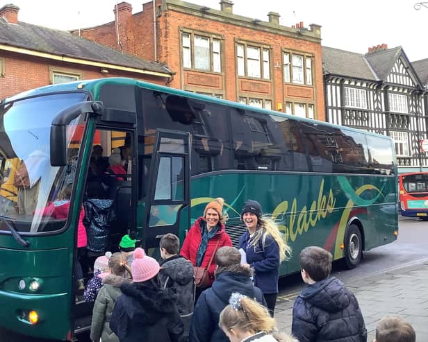 Staff and pupils from Hady Primary School received a free Christmas chauffeur service to travel through Storm Pia. (Photo: Contributed)
