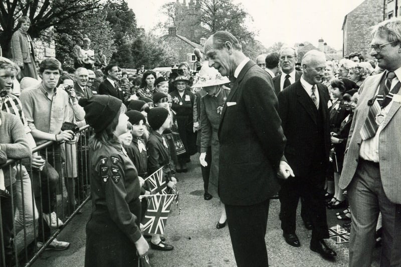 The Duke of Edinburgh chats to Brownies on a visit to Tideswell in 1984.
