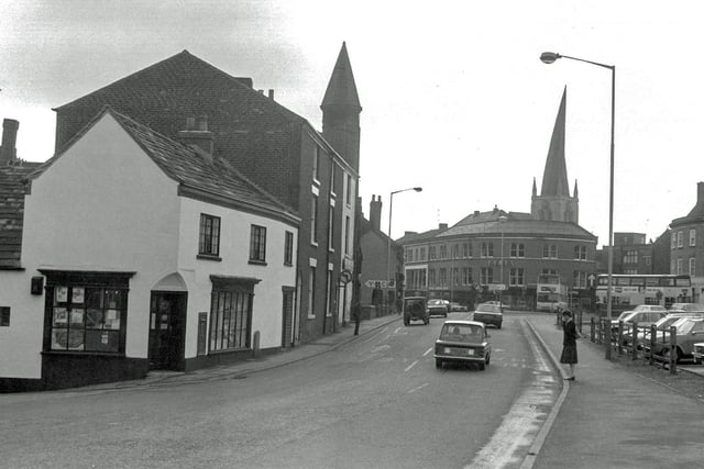The junction of Holywell Street and Brewery Street with the car park to the right, Eyres and the Spire visible. c.1970s