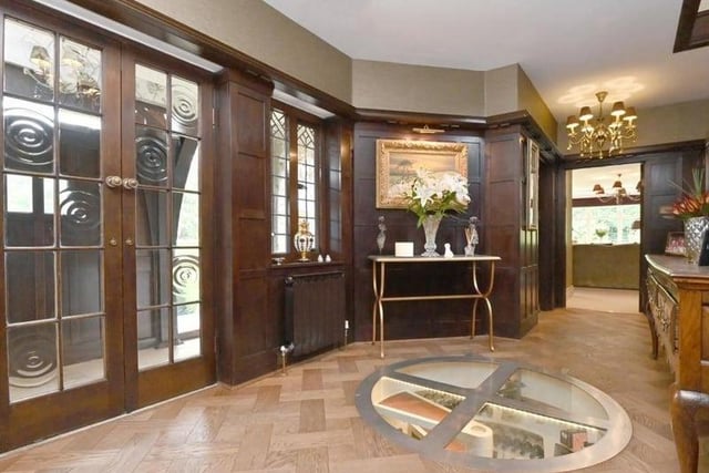 Located just behind the porch, where the front door immediately leads to, this magnificent hallway leads you to every room on the ground floor and offers a small peak down to your expansive wine collection too.
