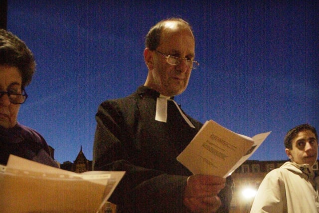 The rev Michael Sadgrove reading lessons at the peace gardens to the gathered throng in 2001