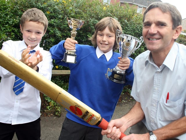 Old Hall teacher received a cricket award from Mike Gatting in 2008, Steve Lawrence with pupils Christopher Thompson (left) and Jordan Reynolds.