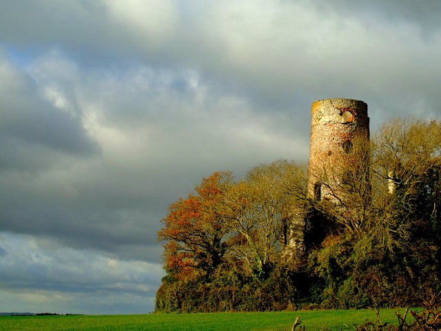 Racton Ruins with the surrounding trees showing of their Autumn Colours.