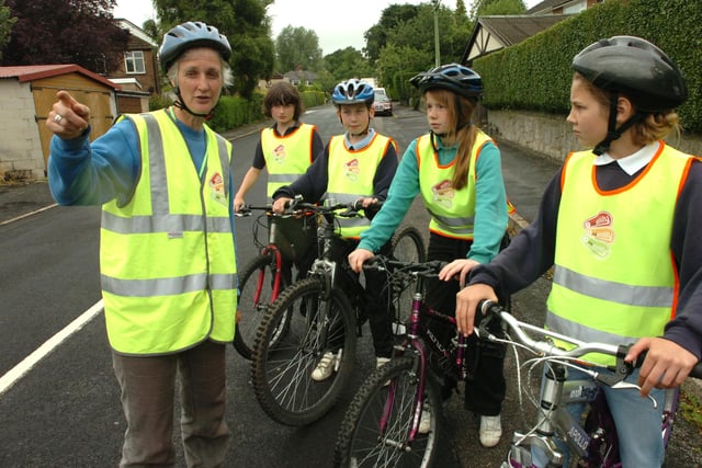 Bikeability Instructor Polly Blacker with l/r: James Fatmer, Oliver Firth, Eloisa Howe and Holly Housley during the Bikeability session at Totley Primary School in 2007