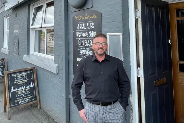 Landlord Craig Murtagh standing outside the Three Horseshoes, Clay Cross