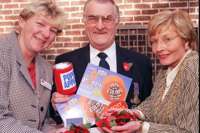 The launch of the poppy appeal at the main Doncaster Post office in 1998. Angie Coxon, Brian Evans and Yvanne Woodcock.