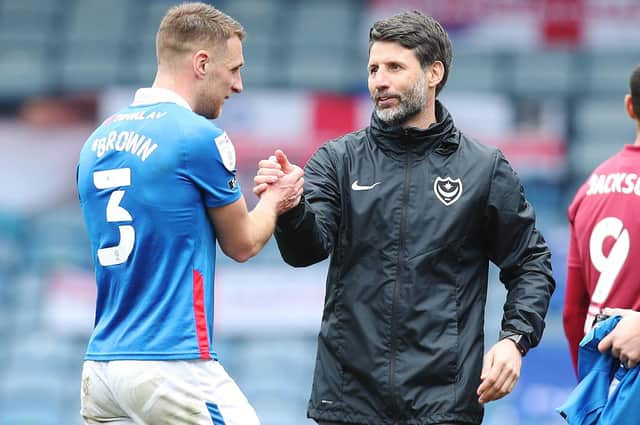 Danny Cowley congratulates Lee Brown at the final whistle of Pompey's defeat of Ipswich. Picture: Joe Pepler