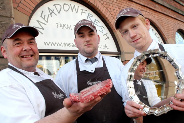 Richard Chamberlain, shop manager with Meadowfresh's prize burgers, and  staff Simon Gascoyne and Daniel Lock in 2010.