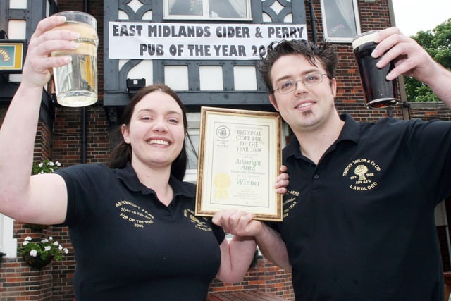 Kathy Shorrock and John Chadwick cheer Duckmanton's Arkwright Arms being awarded cider pub of the year in 2008.