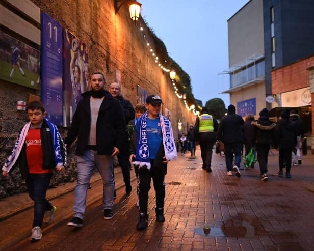 Chesterfield fans make their way towards the stadium ahead of the Emirates FA Cup third round match between Chelsea and Chesterfield at Stamford Bridge on January 08, 2022.