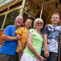 Family about to board a tram at the award-winning centre.